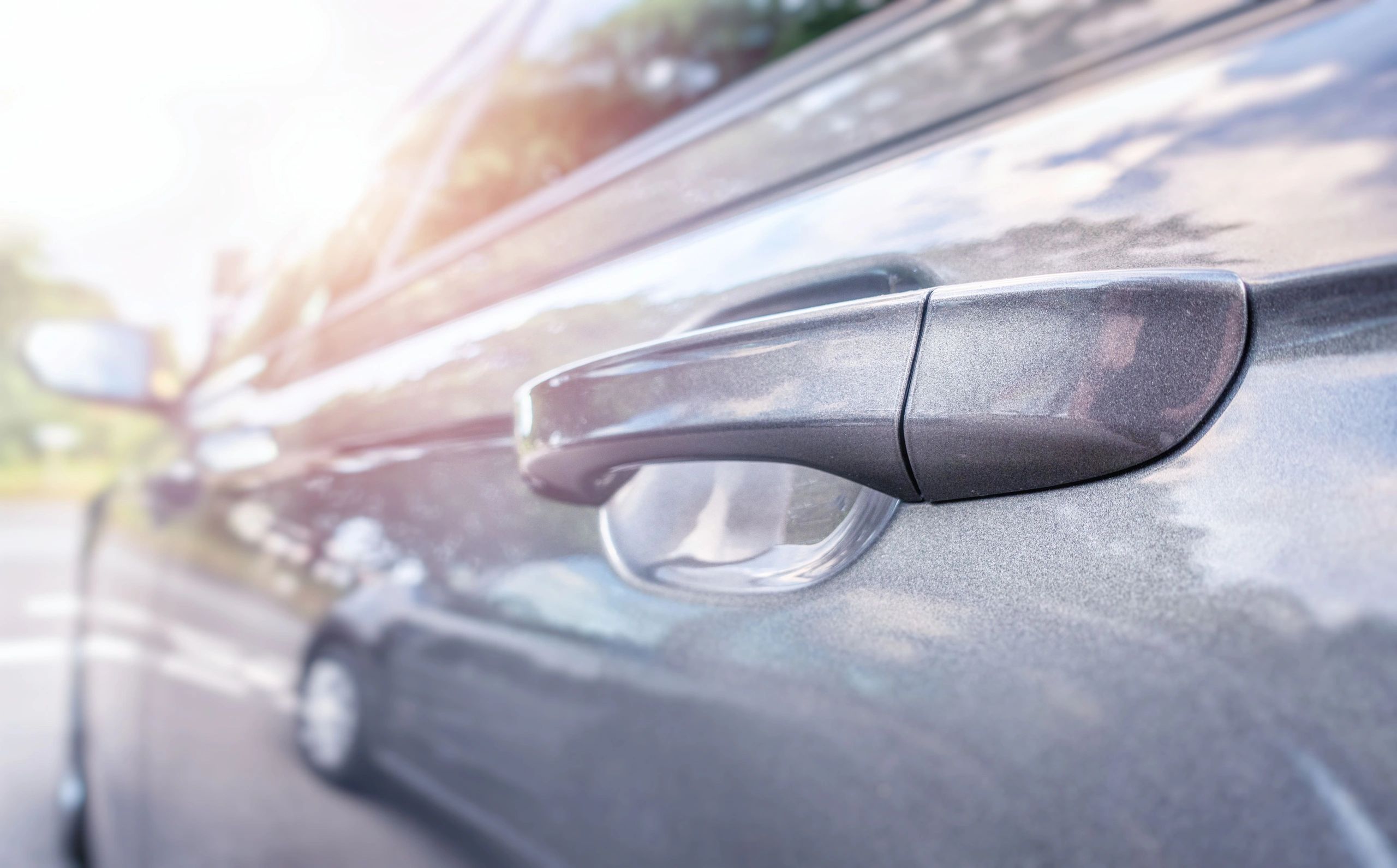 Classic car door handle detail representing Impala craftsmanship