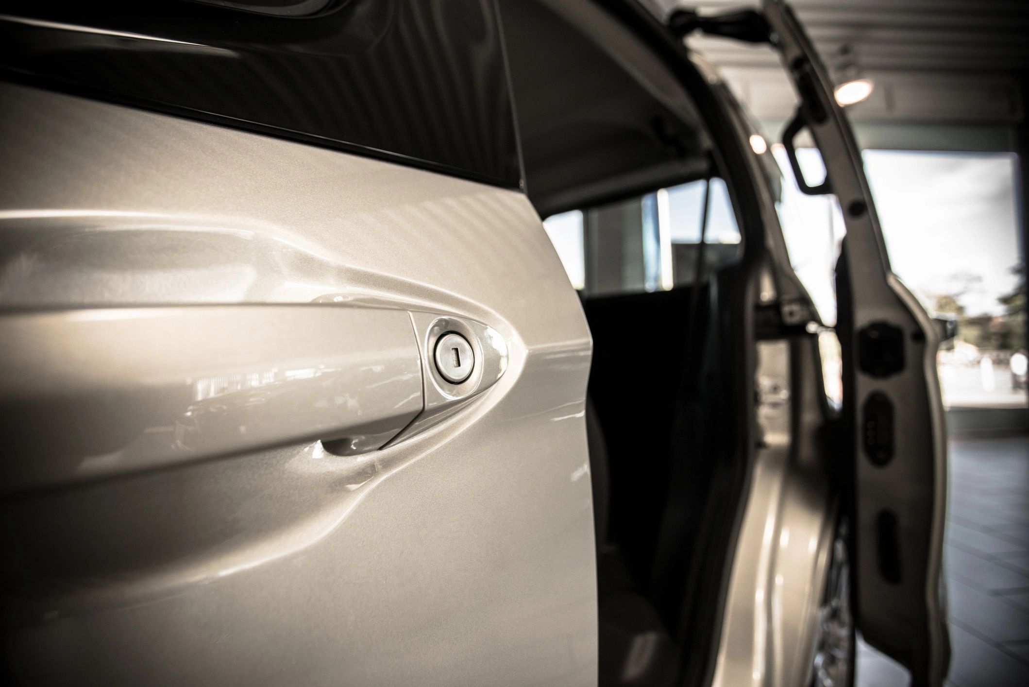 Open car door detail for Impala-inspired gallery